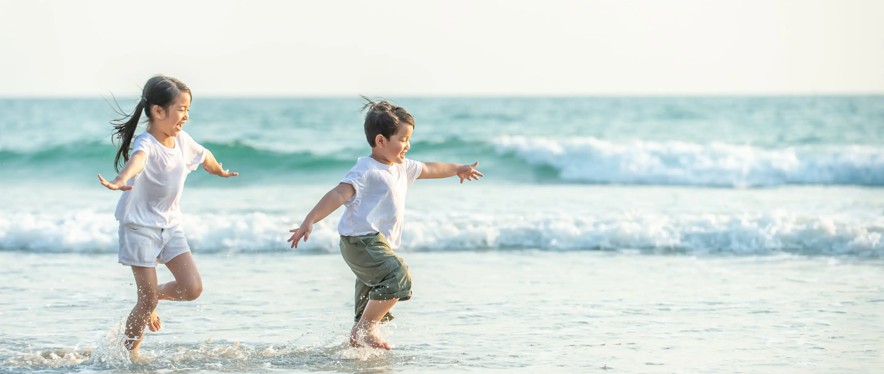 Children playing in the sea